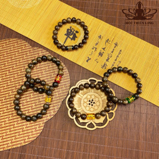 Vòng Tay Trầm Hương Hạt Tròn - Mộc Thiên Long - Mix Charm Chú Omani