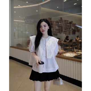 Set áo smi trắng cổ vạt họa tiết chân váy xếp ly by Charmie
