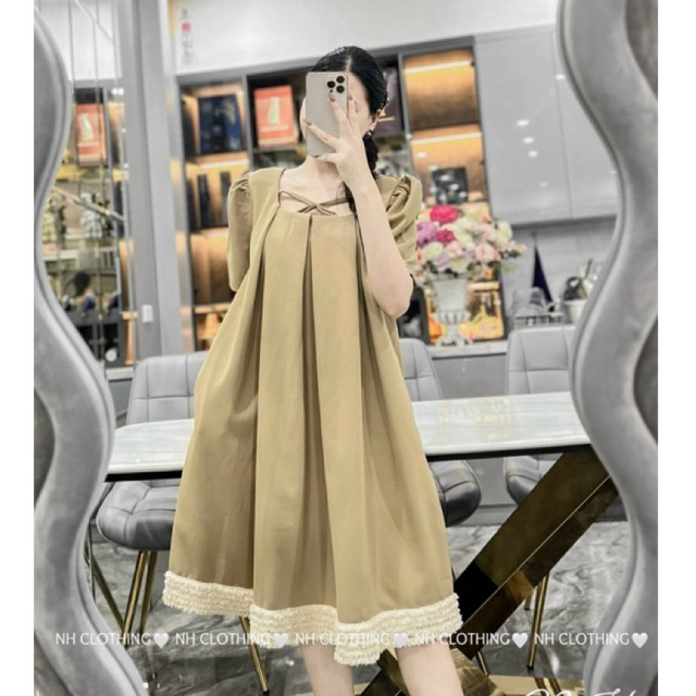 Váy xếp li nơ cổ sm
