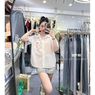 Áo sơ mi nữ cộc tay chất thô giấy form xuông .