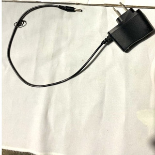 Sạc pin chân đơn tròn đèn pin đeo đầu cell chân 2,5mm