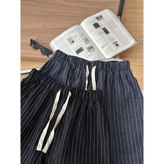 Quần short thô kẻ nơ