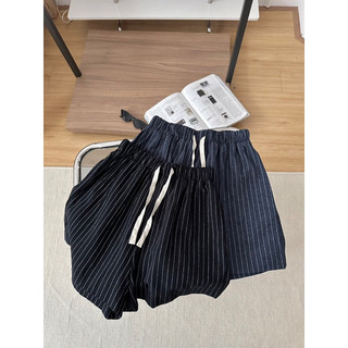 Quần short thô kẻ nơ