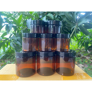 Hủ nhựa PET thân nâu nắp đen.