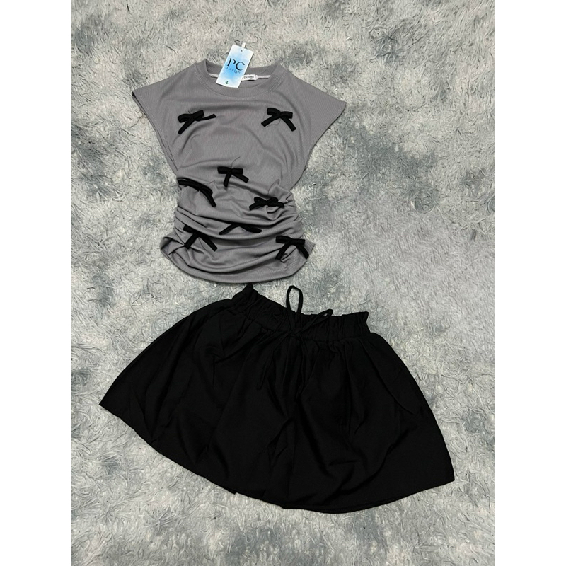 Set Bộ Áo Thun Babytee Tay Ngắn Raplang Đính Nơ Nổi Croptop + Chân Váy A Xoè Có Lót Quần | BigBuy360 - bigbuy360.vn