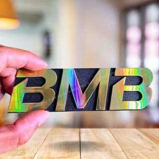 Logo loa bmb nhựa cứng dán loa - 2 tem