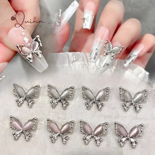 Charm kim loại hồ điệp mắt mèo trắng hồng - trang trí nail móng tay