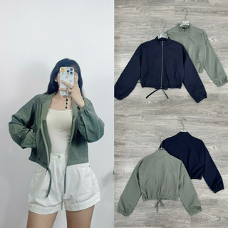 HIPU.VNXK - Áo khoác dù Mixxo rút eo phối dây kéo tiện lợi.