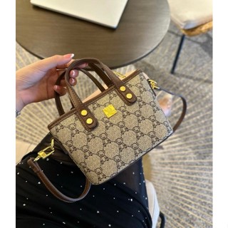 Túi đeo chéo nữ hàng hiệu đi chơi phối dây vải xoắn xích vàng hiện đại -  KN2642