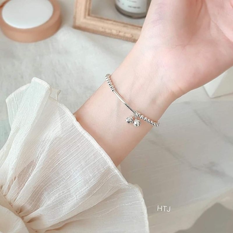 Lắc tay bi bạc treo chuông