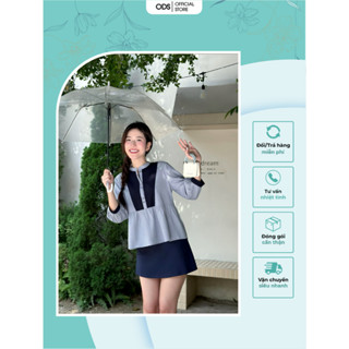 Áo Babydoll xanh jean ODS thiết kế cổ trụ, phối xạnh đen giữa thân, gài nút, tay phồng lỡ trẻ trung năng động - DW9