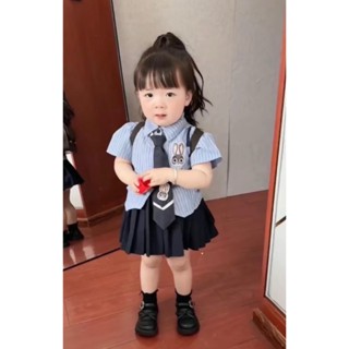  Đồ bộ bé gái - Set bộ đi học 3 chi tiết logo thỏ gồm áo sơ mi kẻ sọc phối chân váy xếp li và cà vạt xinh size từ 9-28 kg 