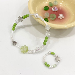 Set phụ kiện - Vòng tay, Nhẫn hạt cườm hình cỏ bốn lá may mắn - Chew