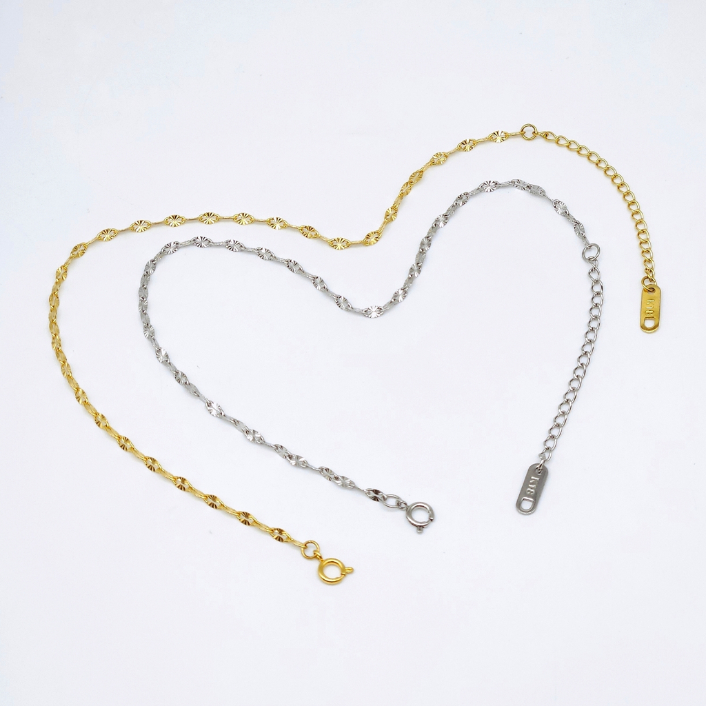 Lắc chân titan nữ dây họa tiết cánh quạt sáng màu dùng khóa tròn không đen gỉ