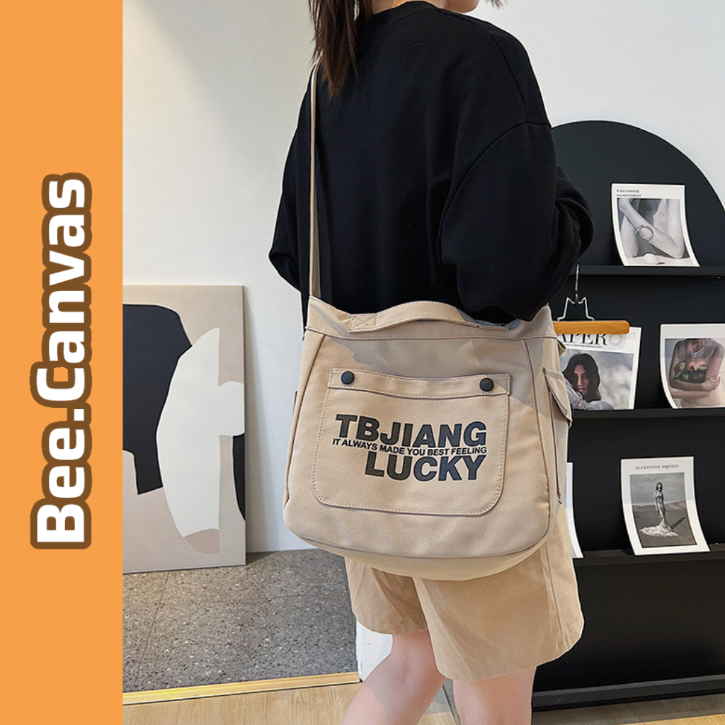 Túi vải canvas đeo chéo nam nữ, vai nhiều ngăn khóa kéo in chữ đựng đồ học chơi đựng Laptop form to