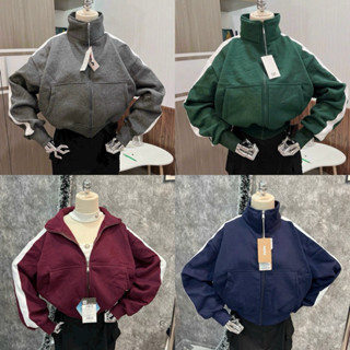 Áo khoác nỉ lửng tay phồng viền sọc cổ trụ khoá kéo