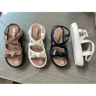 Dép quai hậu nữ hình lơ bo chun Miu Miu