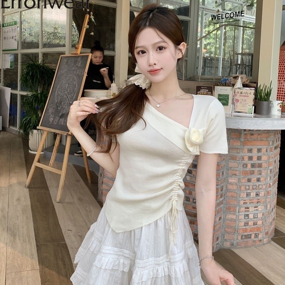 Áo thun nữ kiểu phối trễ vai tiểu thư, cài hoa xinh đẹp, chất thun tăm co dãn dễ chịu, không bai nhão