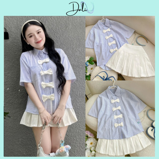 Set Áo Sơ Mi Tay Ngắn Kẻ Xanh From Rộng Khuy Nơ + Chân Váy Xếp Li Trắng Có Quần Trong