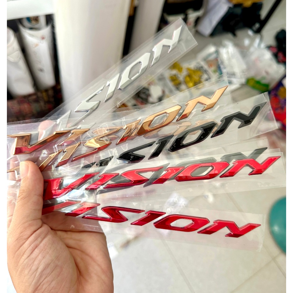 Tem VISION 2014 - 2019 chữ nổi ốp sườn. Logo dán xe Honda Vision 2019 xi mạ cao cấp, có sẵn keo dán