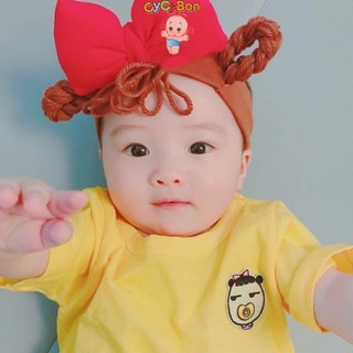 Băng Đô Cho Bé Gái Thun Đính Nơ Đỏ Cam Kèm Tóc Giả Len Thắt Bính Cuộn 2 Bên
