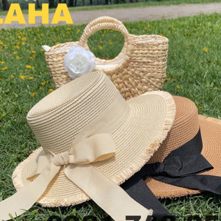 Mũ cói vành ngang vành tua rua thắt nơ xinh xắn