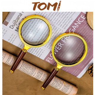 Kính lúp phóng đại cầm tay tomi 121