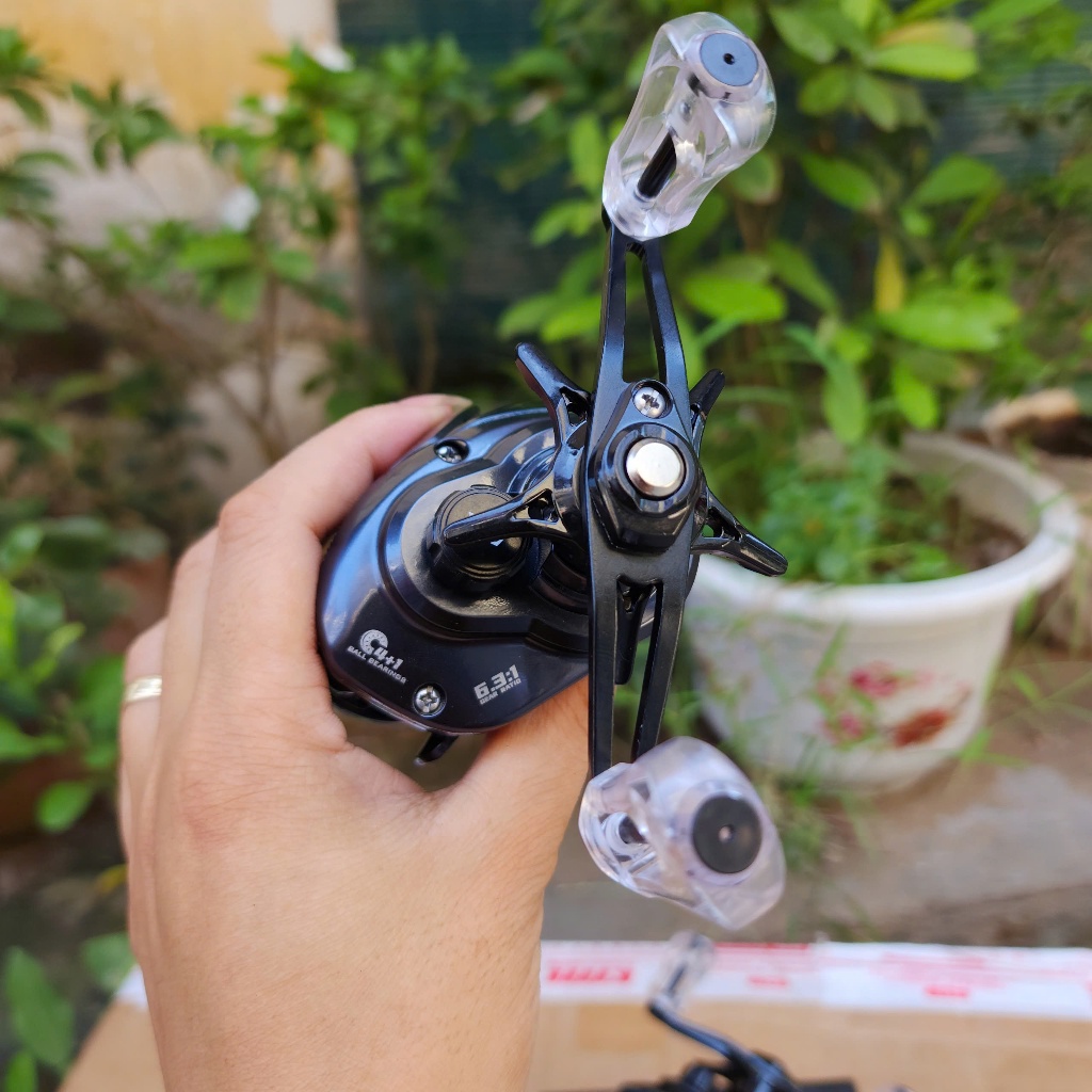 máy câu cá ngang tay trái - tay phải