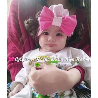 Mũ Nón Turban Cho Bé Gái Thun Cotton Hồng Phấn Đính Nơ Kèm Tóc Giả Búi 2 Bên