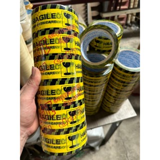 băng keo hàng dễ vỡ 5cm- 100y 1 cây 6 cuộn/1kg lõi mỏng keo nhiều có chữ vui lòng xin nhẹ tay.!