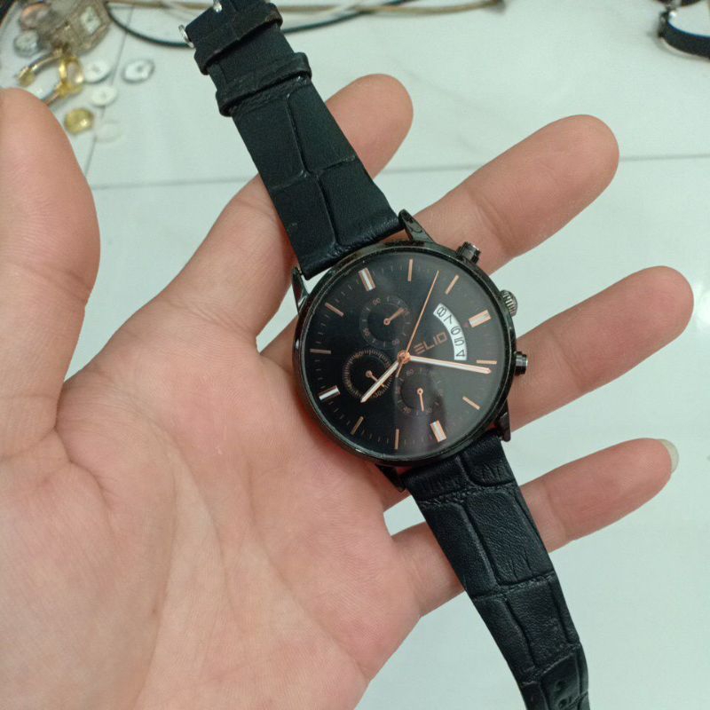 đồng hồ si nhật nam dây da hiệu ELIO hoạt động ful 6 kim 1 cửa lịch màu đen độ mới 85%