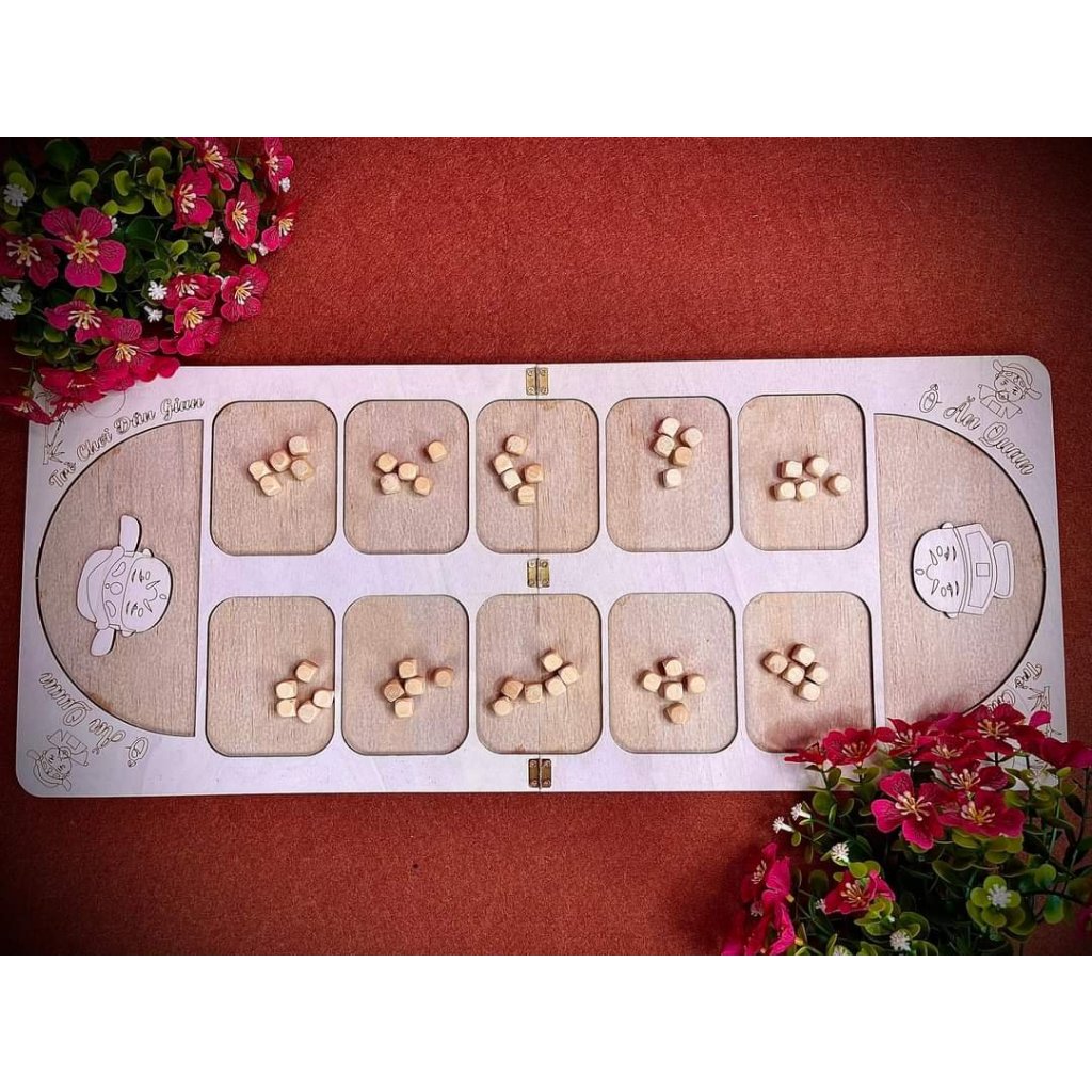 Bộ đồ chơi dân gian ô ăn quan bằng gỗ giúp cho bé rèn luyện kỹ năng tính toán