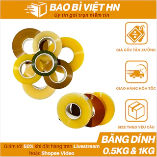 Băng dính đóng gói hàng 0,5kg và 1kg trong suốt lõi mỏng đóng hàng - Bao Bì Việt HN