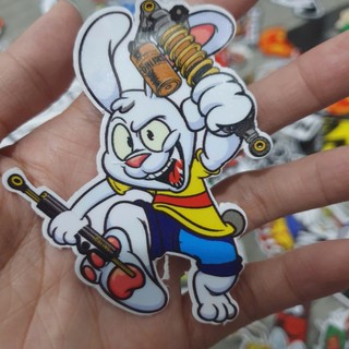 Tem dán sticker hình thỏ cầm phuộc size 6.5x8.3cm dán trang trí xe, điện thoại, nón bảo hiểm...