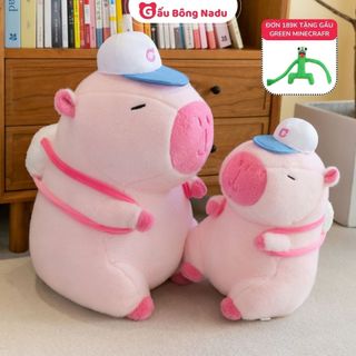 Gấu bông chuột capybara hồng đội mũ đeo bóng, thú nhồi bông capybara hồng bông mềm mịn gấu bông nadu
