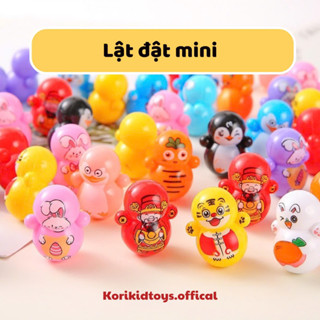 Lật đật mini cute dễ thương nhiều loại  mô hình phi hành gia và doraemon cho bé