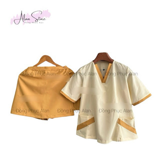 Đồng phục spa/ đồng phục thẩm mỹ viện quần giả váy màu kem viền vàng hồng nâu xanh