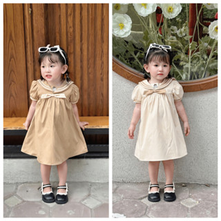 Váy kaki cổ thủy thủ tay bồng thêu hoa ngực Mozi cho bé gái