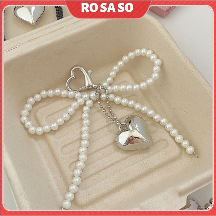 Phụ kiện gắn túi charm nơ trái tim