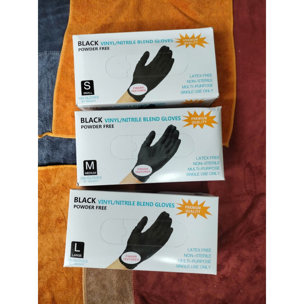 1 Hộp bao tay đen có 100 bao tay dùng cho tiệm tóc