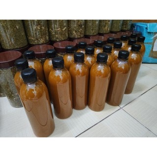 500ml cốt nghệ hạt gấc Tuệ Linh thoa mặt sau sinh