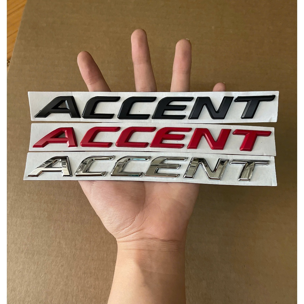 Logo Accent được dán phía sau xe Hyundai Accent chất liệu kim loại cao cấp có 3  màu lựa chọn