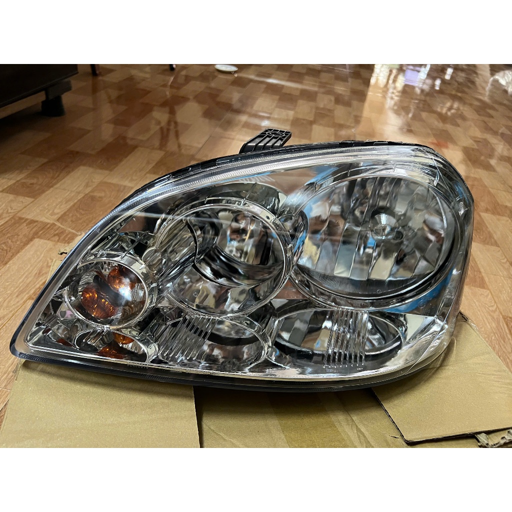 đèn pha Lacetti 04 - 09 ( xe trong nước , giá 1  chiếc )