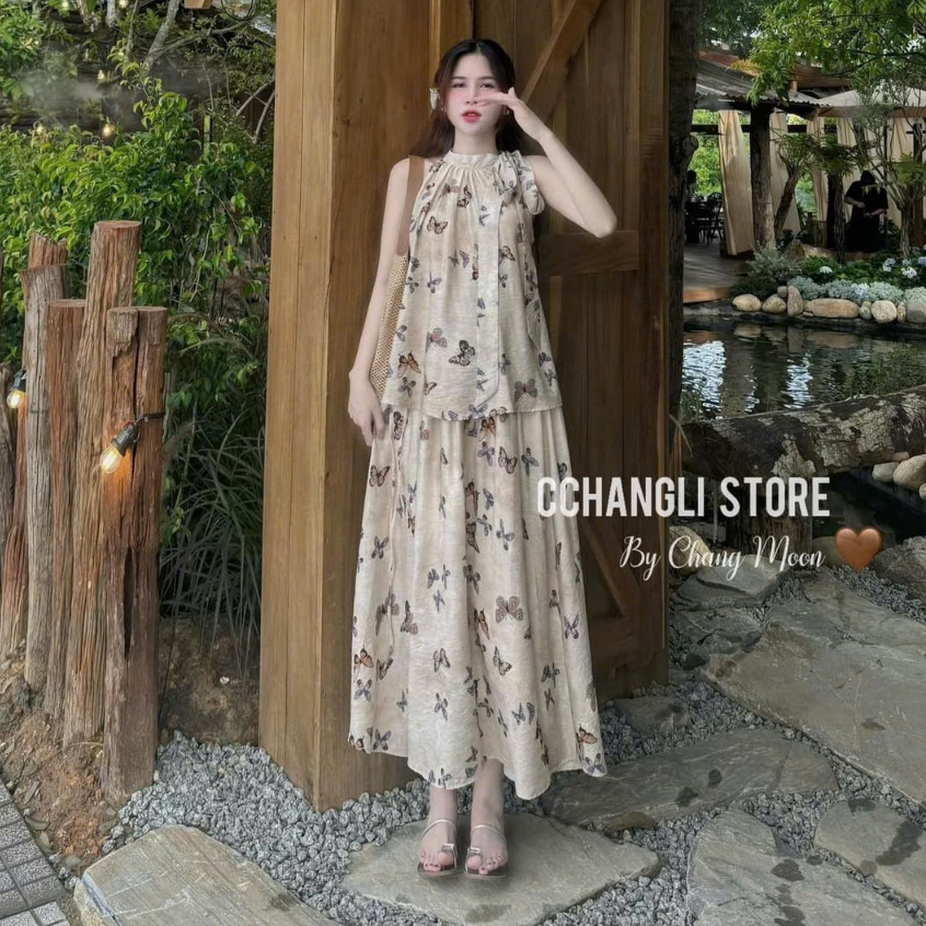 Sét đầm váy nữ áo cổ yếm buộc nơ mix chân váy xòe dai họa tiết dễ thương dành cho các nàng diện đi biển, đi chơi xinh. | BigBuy360 - bigbuy360.vn