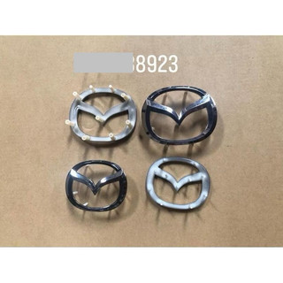 logo vô lăng mazda zin kích thước 6,7cm*5,3cm và 5,7cm*4,5cm