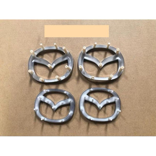 logo vô lăng mazda zin kích thước 6,7cm*5,3cm và 5,7cm*4,5cm