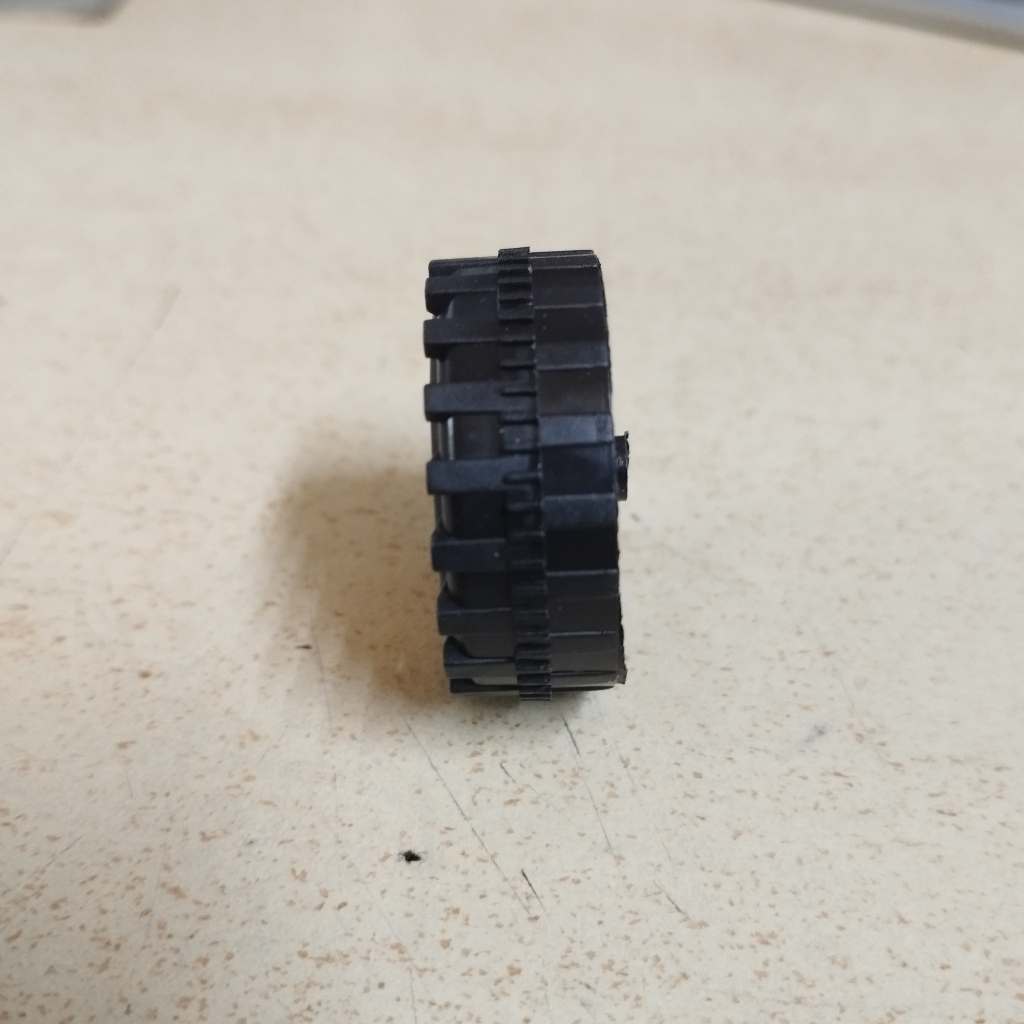 Bánh xe nhựa đường kính 34mm rộng 12mm và trục 2mm