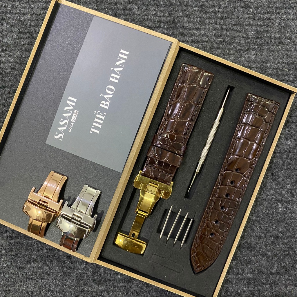 1. Dây đồng hồ CHỐT THÔNG MINH DA CÁ SẤU Vân Hạt ,Gồm : 1 Dây + 1 Khoá + 1 Cây tháo lắp