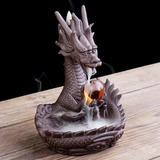 Thác khói trầm hương , trầm hương khói ngược phi long phun châu