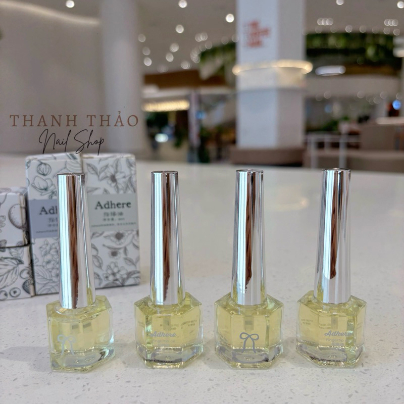 Dầu dưỡng viền móng Adhere dạng chai